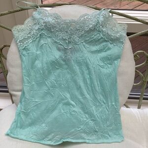 Beautiful aquamarine top with adjustable straps and lace neckline